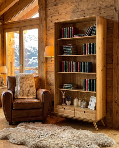 Bibliothèque CA-23 dans un salon chalet montagne